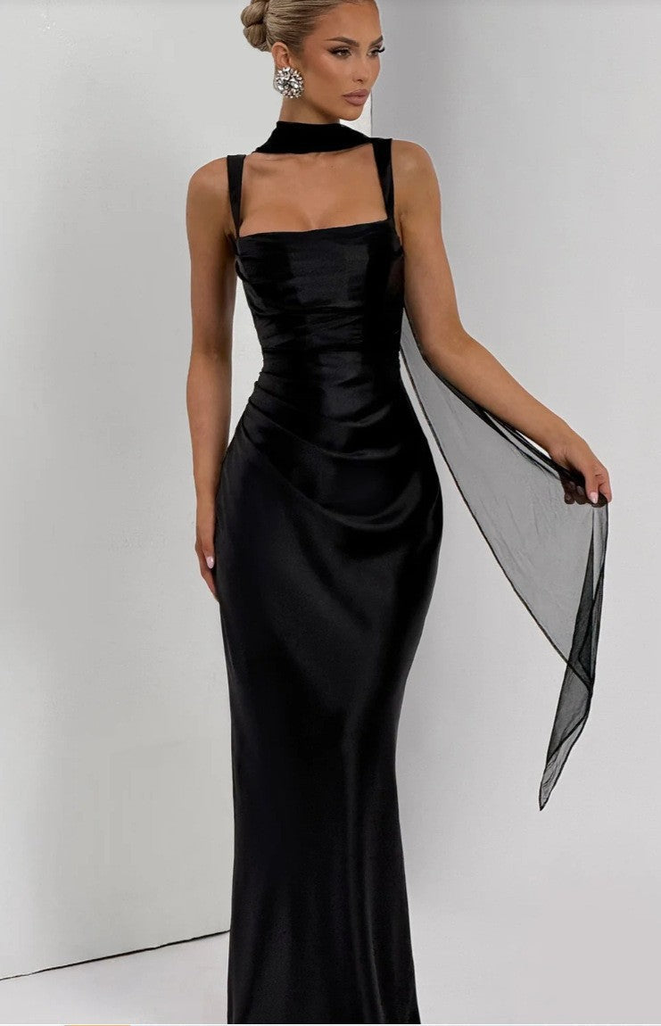 Beautiful women's sleeveless beach maxi dress, elegant ruched waist & lace-up back. Essential summer holiday outfit.