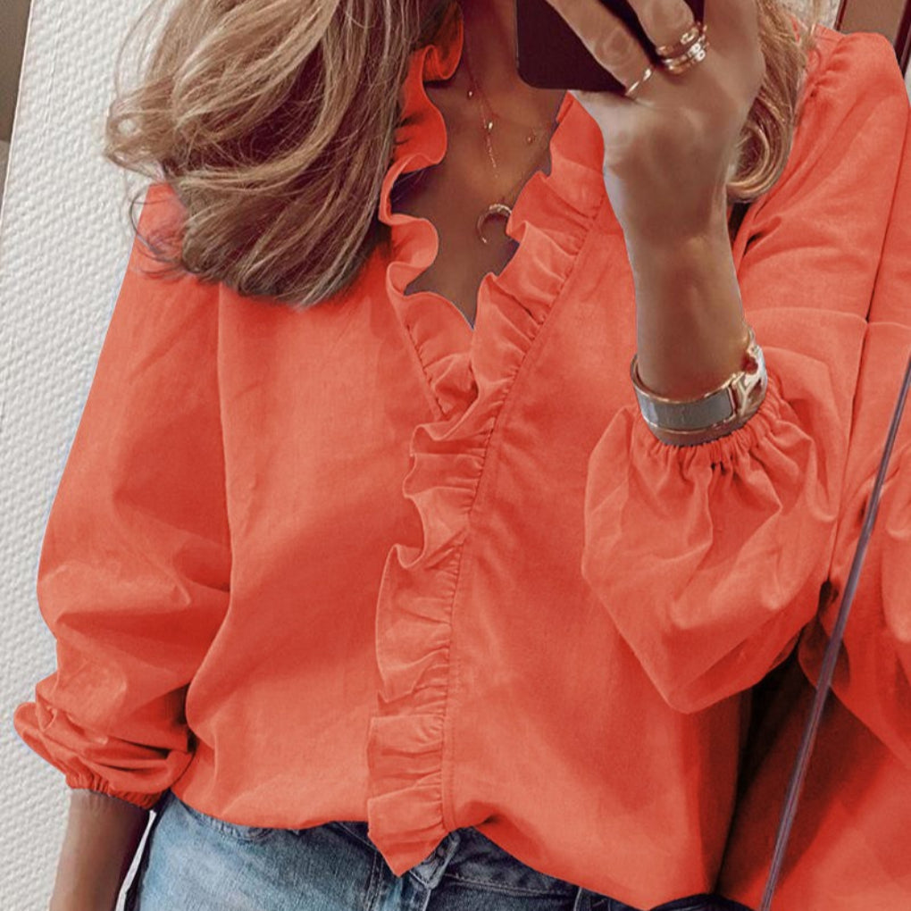 Stylish women's puff sleeve blouse, a versatile top with ruffle trim for formal or casual outfits.