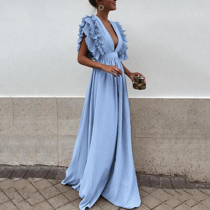 Elegant women's ruffled maxi dress, perfect for evening events & special occasions. Timeless feminine style.
