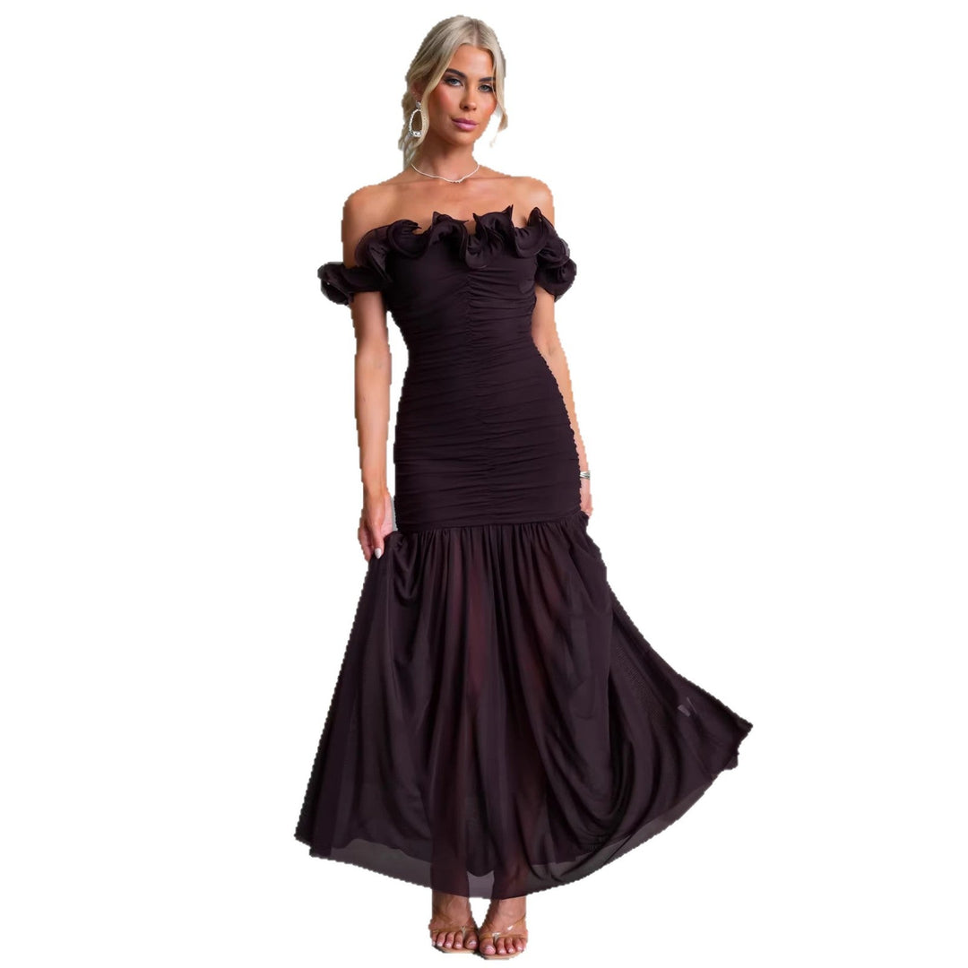 Close-up of a women's elegant ruffled off-shoulder neckline on a maxi dress, great for special occasions.