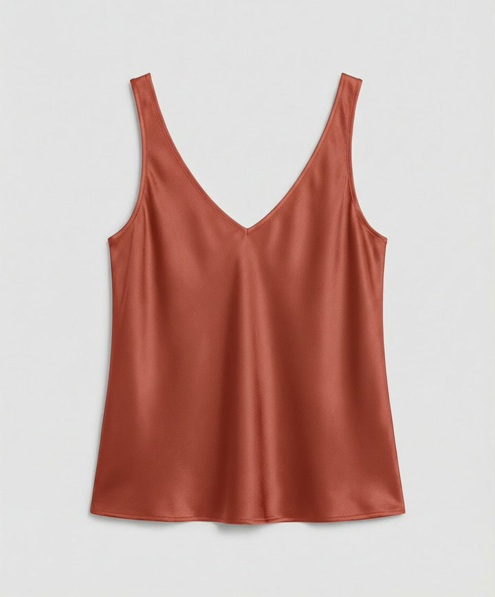 Women's elegant satin V-neck camisole top with wide straps. A versatile sleeveless fashion piece for any look.