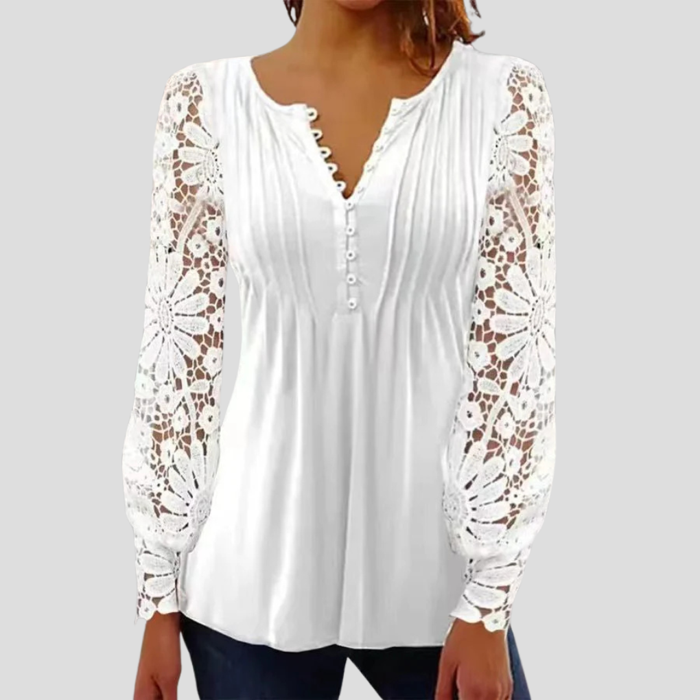 Sophisticated women's elegant top. A modern semi-fitted blouse offering a flattering fit for office and casual elegance.