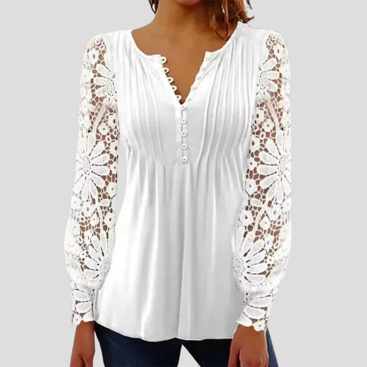 Sophisticated women's elegant top. A modern semi-fitted blouse offering a flattering fit for office and casual elegance.
