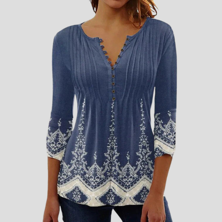Women's elegant top. A semi-fitted blouse designed for chic apparel, sophisticated wear, and a flattering fit.