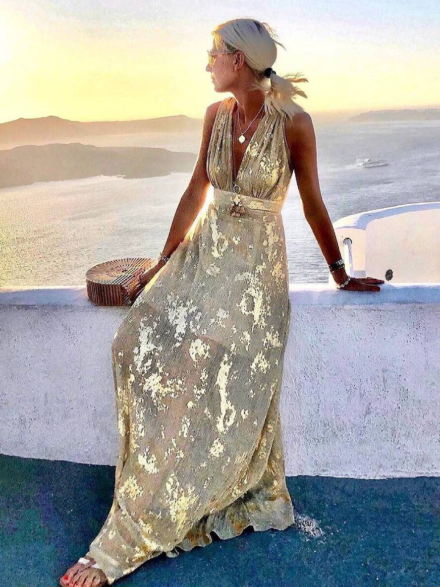 Sparkly sleeveless sequin maxi dress for women, ideal for special occasions, formal events & spring/summer parties.