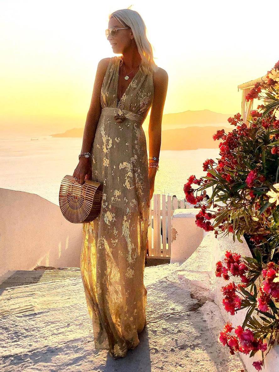 Stunning women's sequin maxi dress, elegant & sparkly. Ideal formal wear for special occasions and evening events.