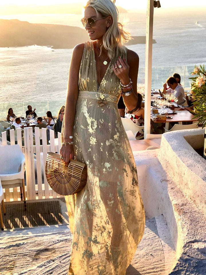 Flattering women's sequin maxi dress, a stunning evening gown or party dress with elegant sparkle & V-neck design.