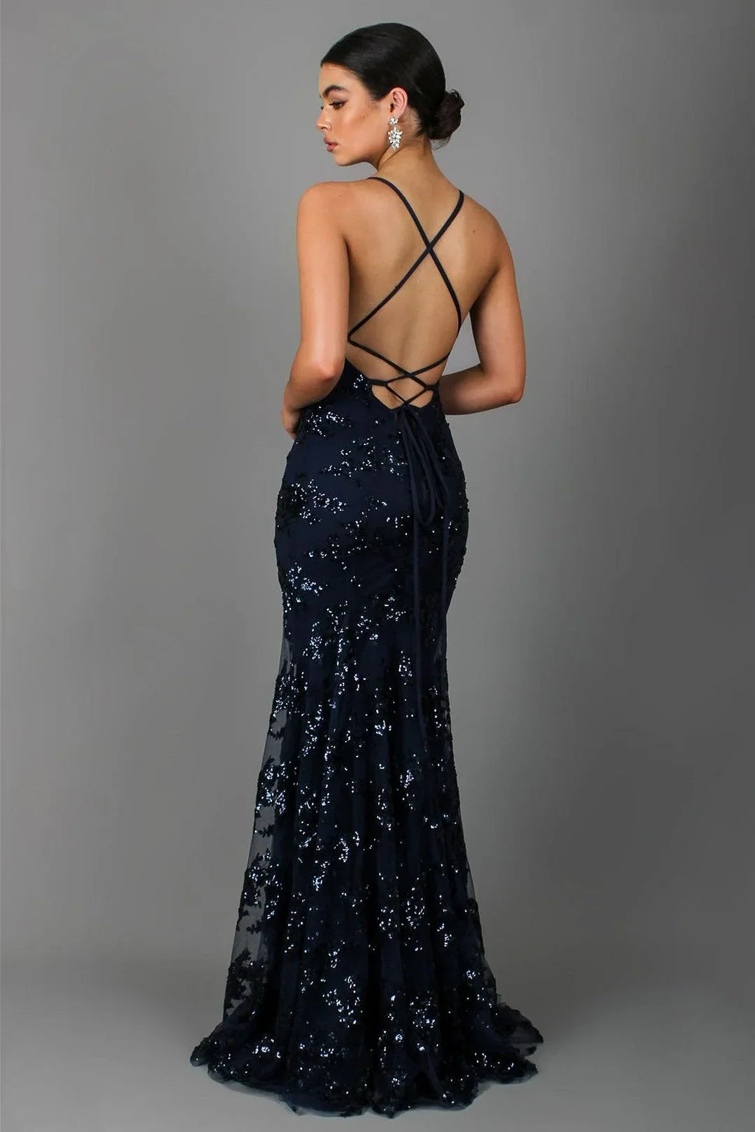 Glamorous women's sequin V-neck maxi dress with a sophisticated backless design for special occasions & parties.