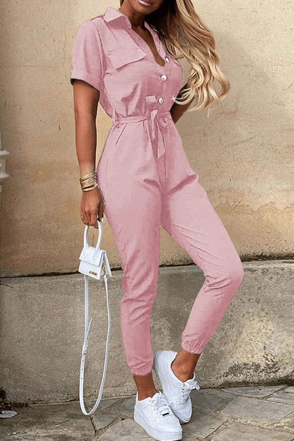 Casual yet chic women's one-piece jumpsuit, featuring a comfortable belted design & shawl collar.