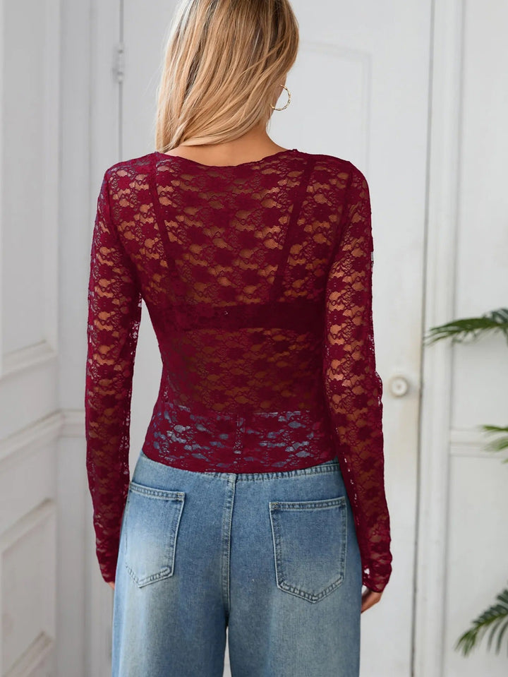 Women's long sleeve sheer top. Elegant and sophisticated, ideal for evening wear, date night, or stylish layering.