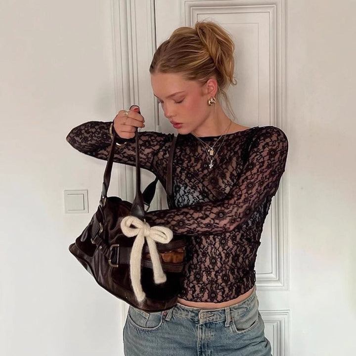 Chic sheer long sleeve top for women. An elegant and versatile layering piece for evening outfits & date nights.