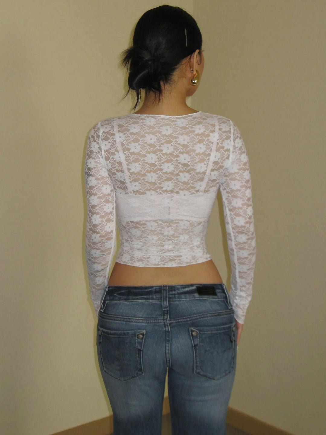 Women's elegant sheer long sleeve top. Chic design for sophisticated evening wear, date night, or versatile layering.
