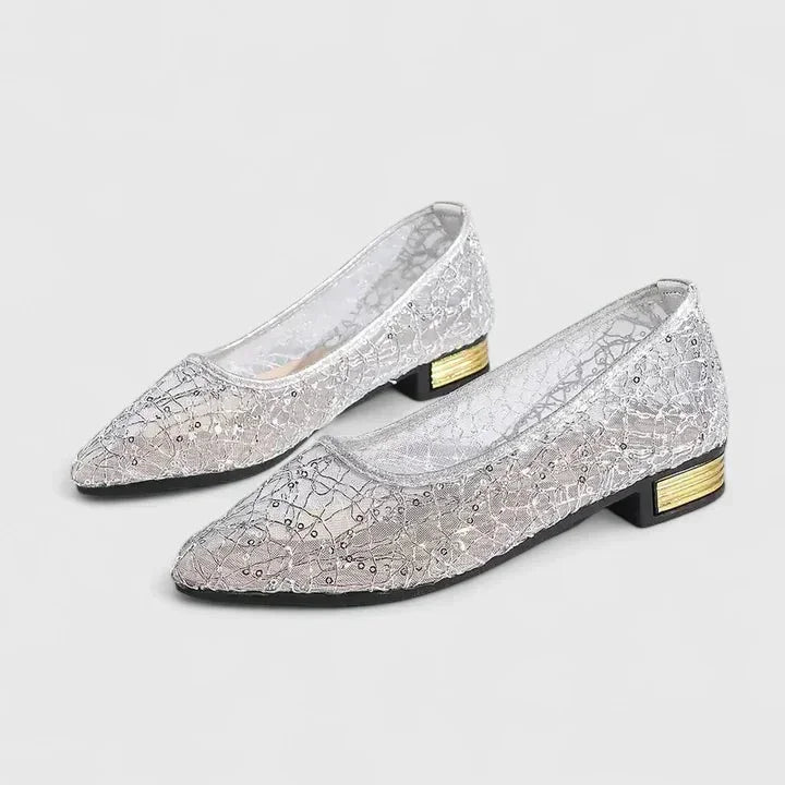 Comfortable sheer pointed-toe women's flats with low block heel. Versatile, elegant, and stylish for any outfit.