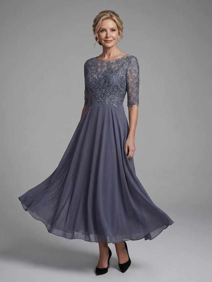 Elegant women's sheer sleeve midi dress with designed top, perfect for sophisticated occasions.