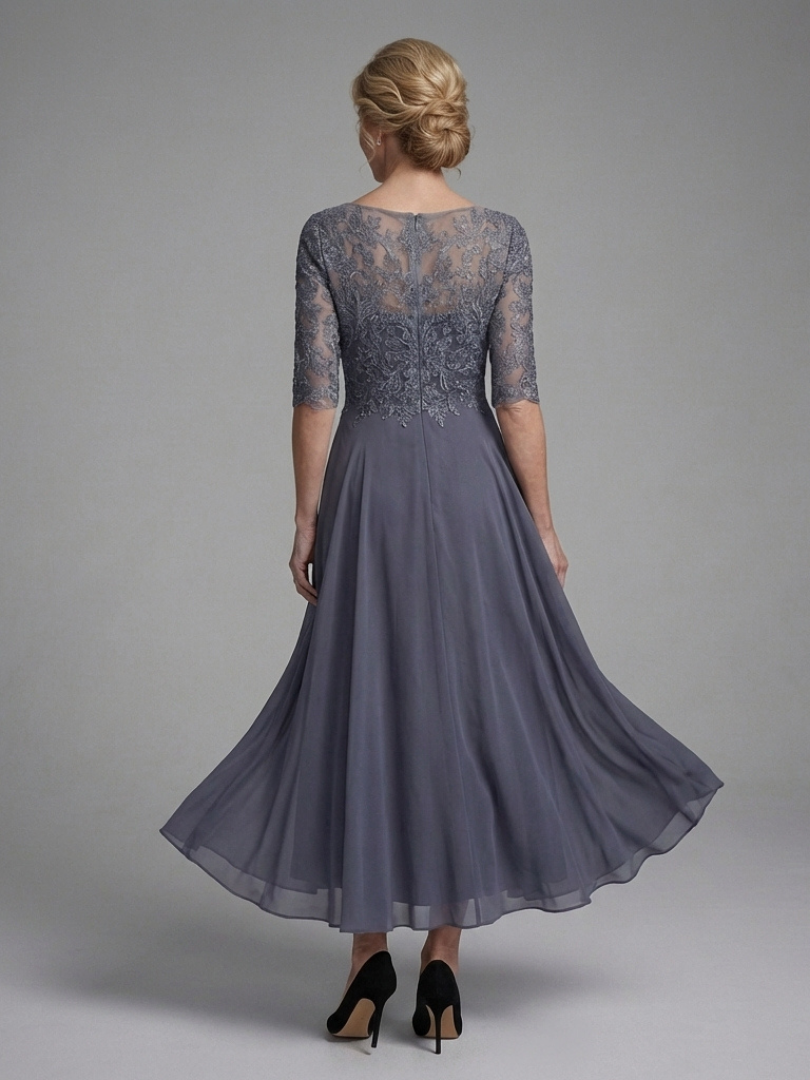Flattering blue elegant midi dress with sheer sleeves, ideal for formal occasions and evening wear.