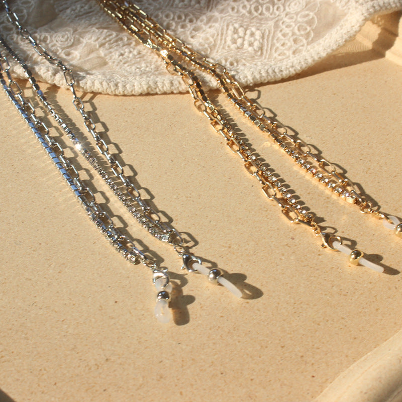 Shimmering silver or gold women's jewelry band, adorned with brilliant zirconia, a timeless fashion accessory.