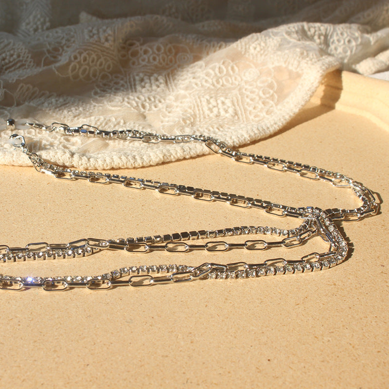 Fashionable women's metal alloy jewelry band, showcasing brilliant zirconia stones for an elegant, sparkling finish.