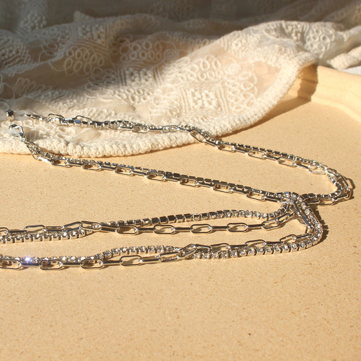 Fashionable women's metal alloy jewelry band, showcasing brilliant zirconia stones for an elegant, sparkling finish.