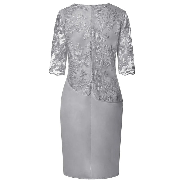 Chic women's short sleeve midi dress, elegant faux-wrap style. A versatile, comfortable dress for any occasion.