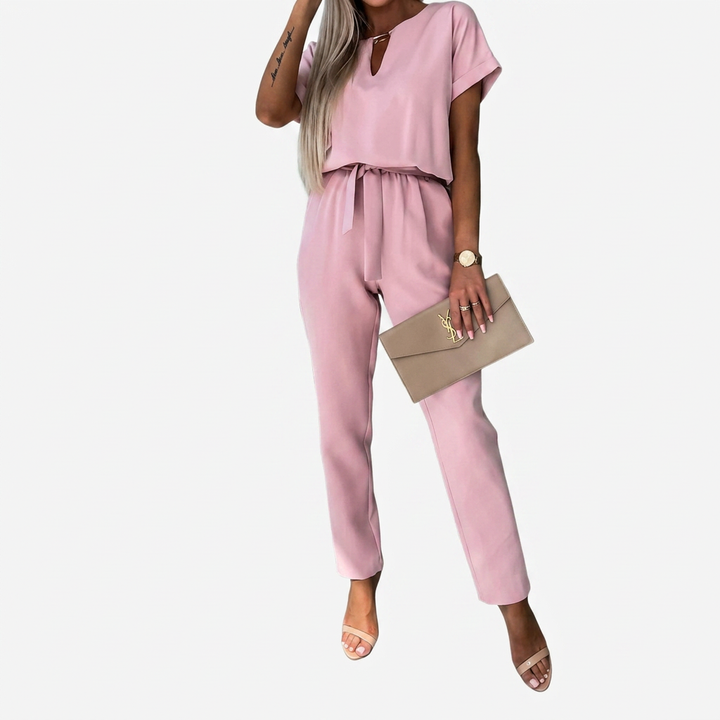 Elegant women's short-sleeve keyhole neck jumpsuit with tapered leg, perfect for office or evening wear.
