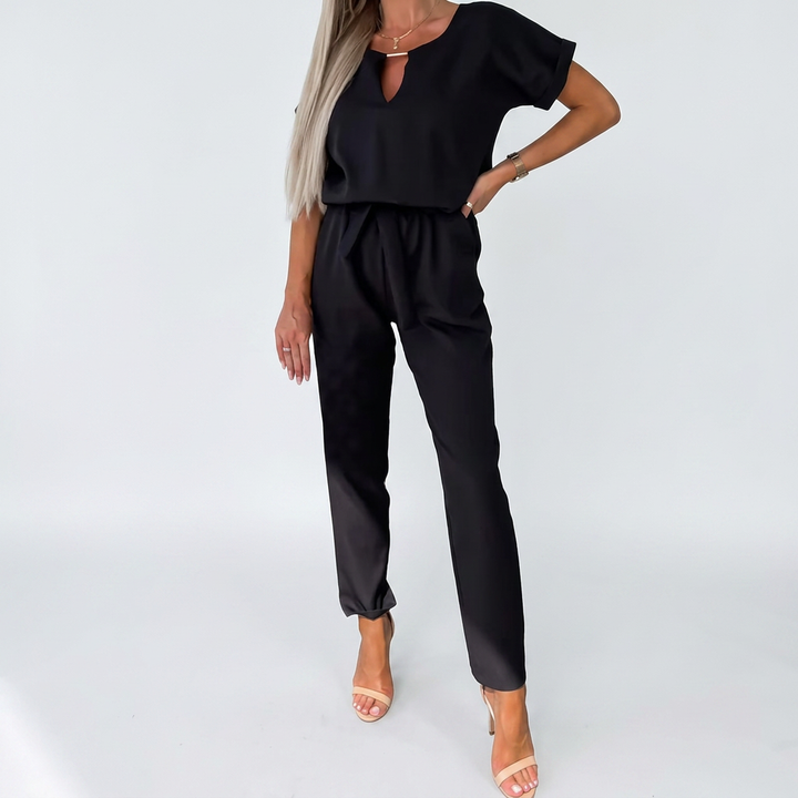 Versatile women's keyhole neck jumpsuit, short sleeves & tapered leg, ideal for dressy casual or chic comfort.