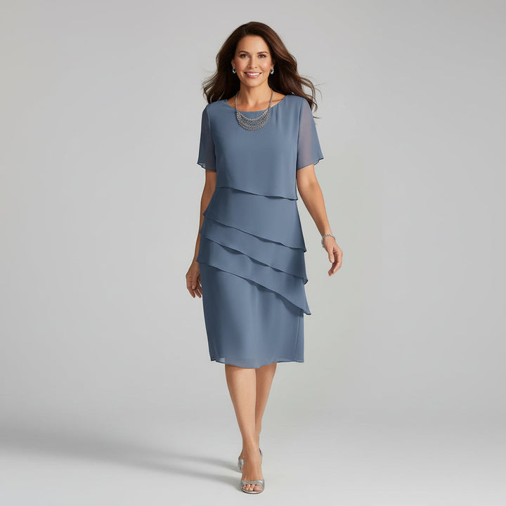 Stylish short sleeve tiered midi dress for women. Comfortable flowy design, ideal for summer parties & elegant occasions.