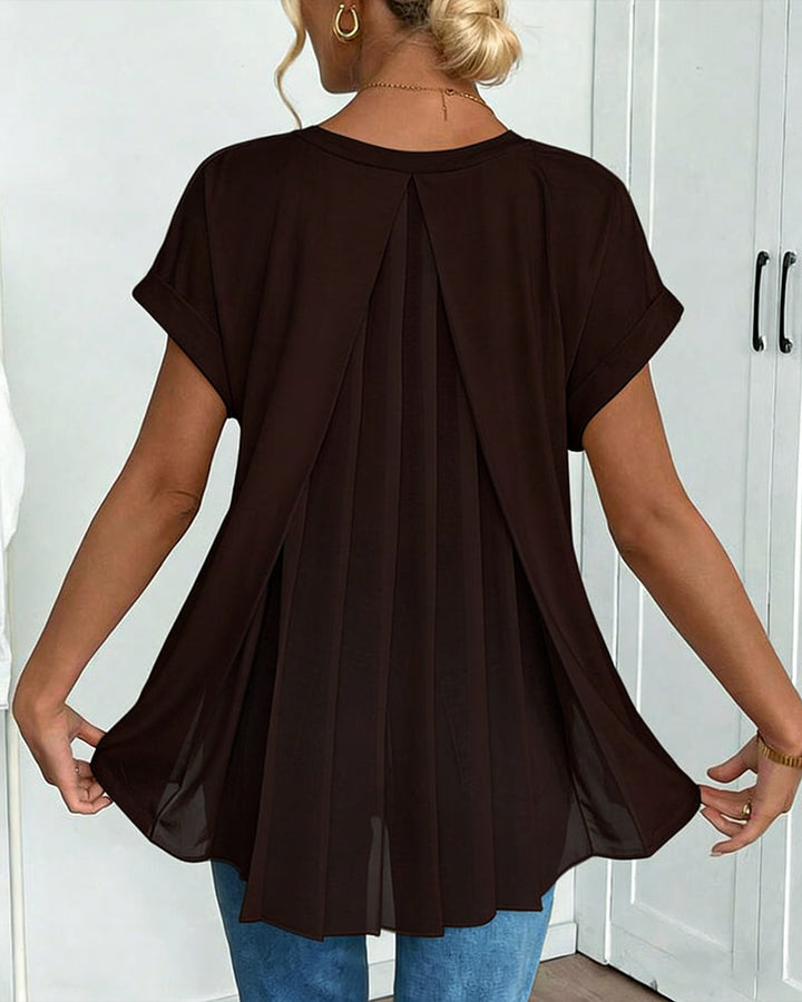 Lightweight women's short sleeve top with elegant pleated back, a stylish and comfortable choice for summer fashion.