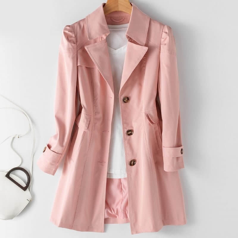 Elegant women's single-breasted trench coat. Classic long outerwear perfect for spring & fall fashion.