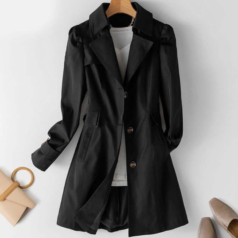 Classic women's single-breasted trench coat, ideal for elegant fall jackets and sophisticated spring outerwear.