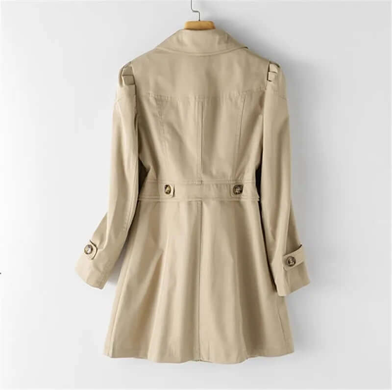 Sophisticated single-breasted women's trench coat. A timeless long jacket, perfect for any women's fashion ensemble.