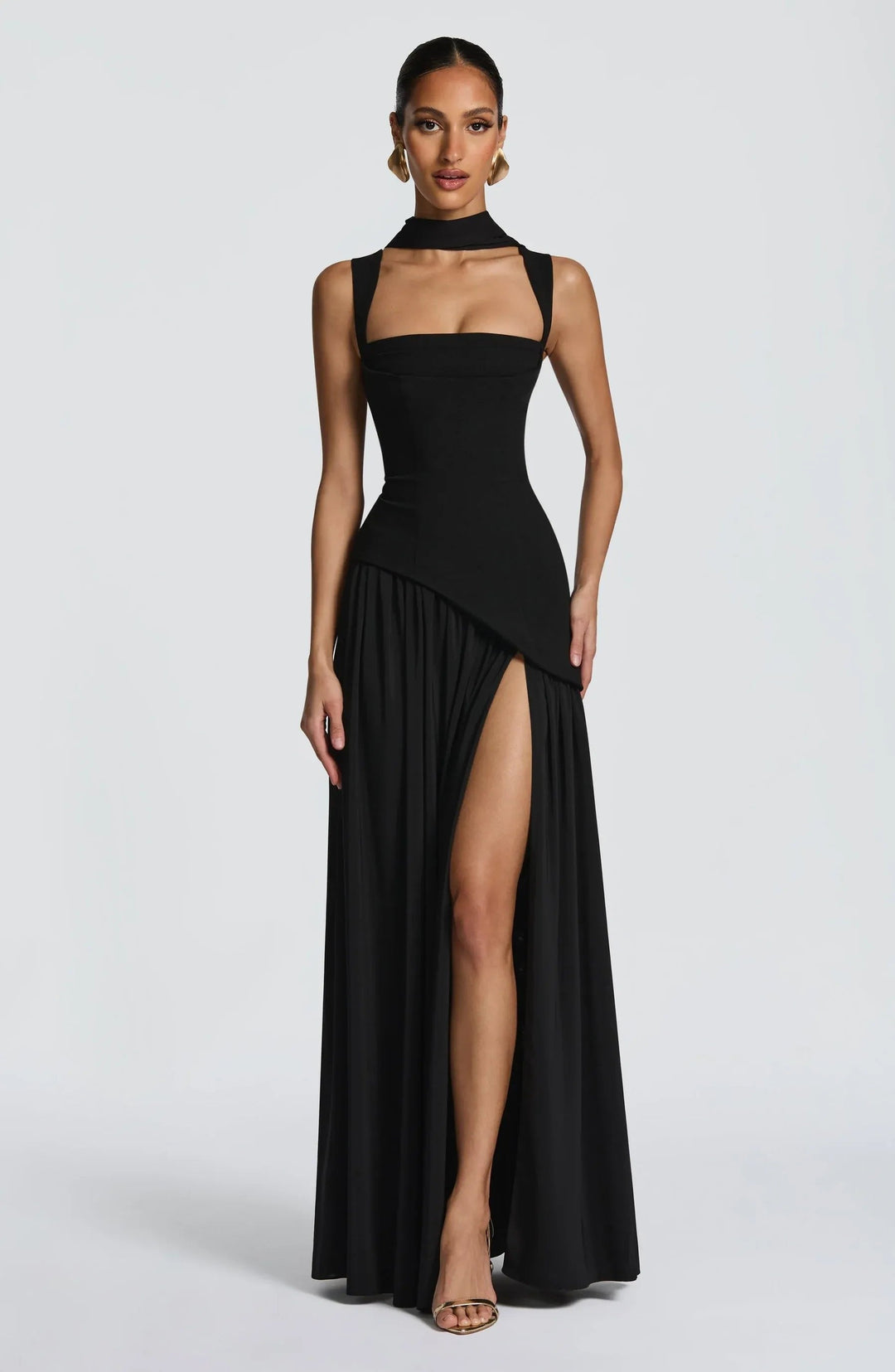 Elegant women's sleeveless A-line maxi dress with fitted waist, perfect for formal events & wedding guests.
