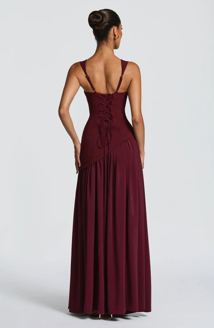Formal sleeveless A-line maxi dress for women, with a chic fitted waist, perfect for special occasions.