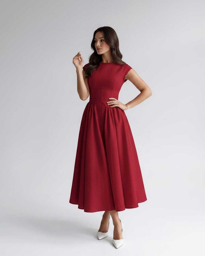 Beautiful women's sleeveless flared A-line midi dress with a comfortable gathered waist.