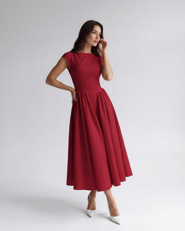 Sophisticated women's A-line midi dress, sleeveless, flared, elegant formal occasion wear.