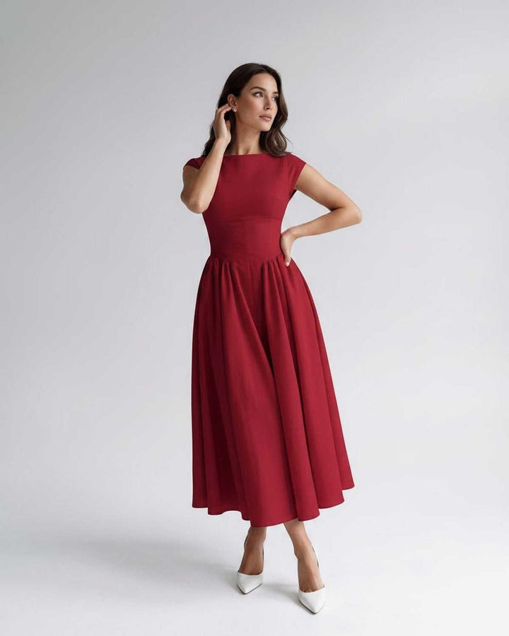 Women's round neck sleeveless A-line midi dress, flattering flared skirt, gathered waist.