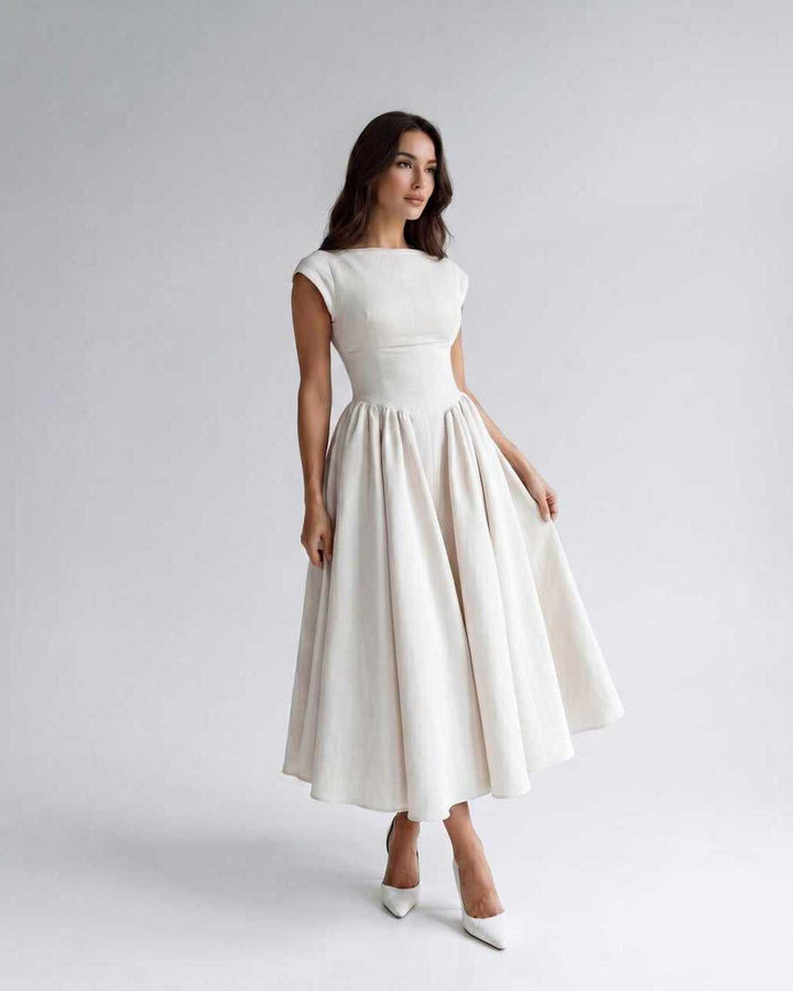 Timeless women's sleeveless A-line midi dress, flared, with a chic gathered waist detail.