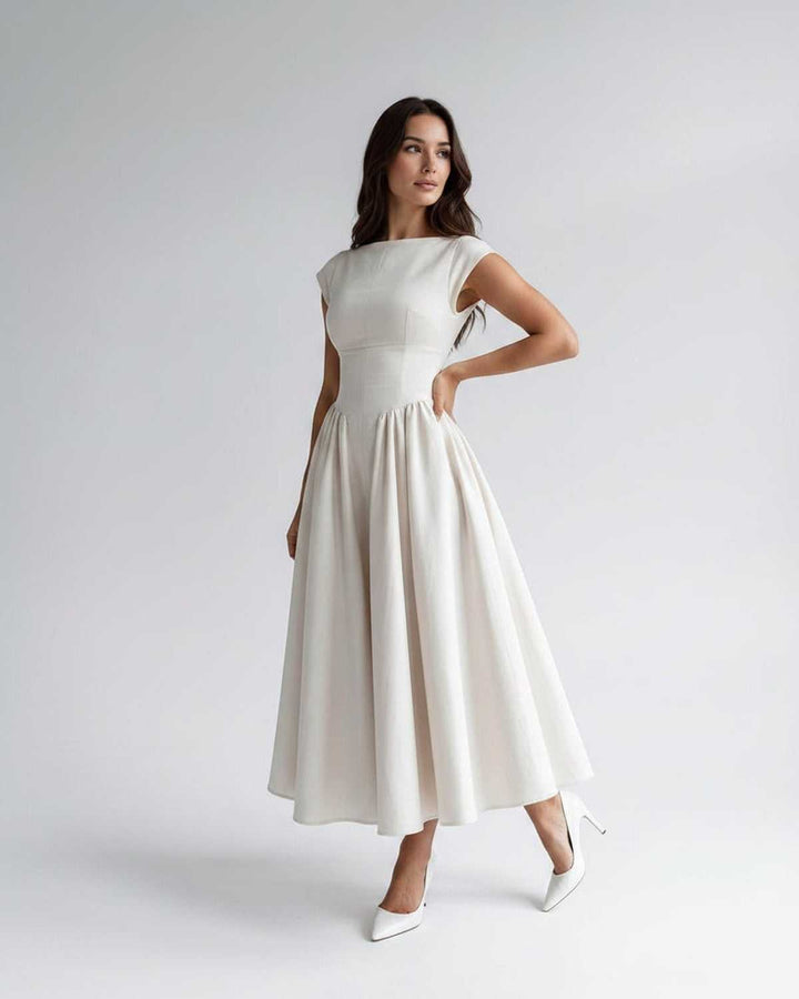 Women's elegant sleeveless midi dress, A-line flared, with a stylish gathered waist design.