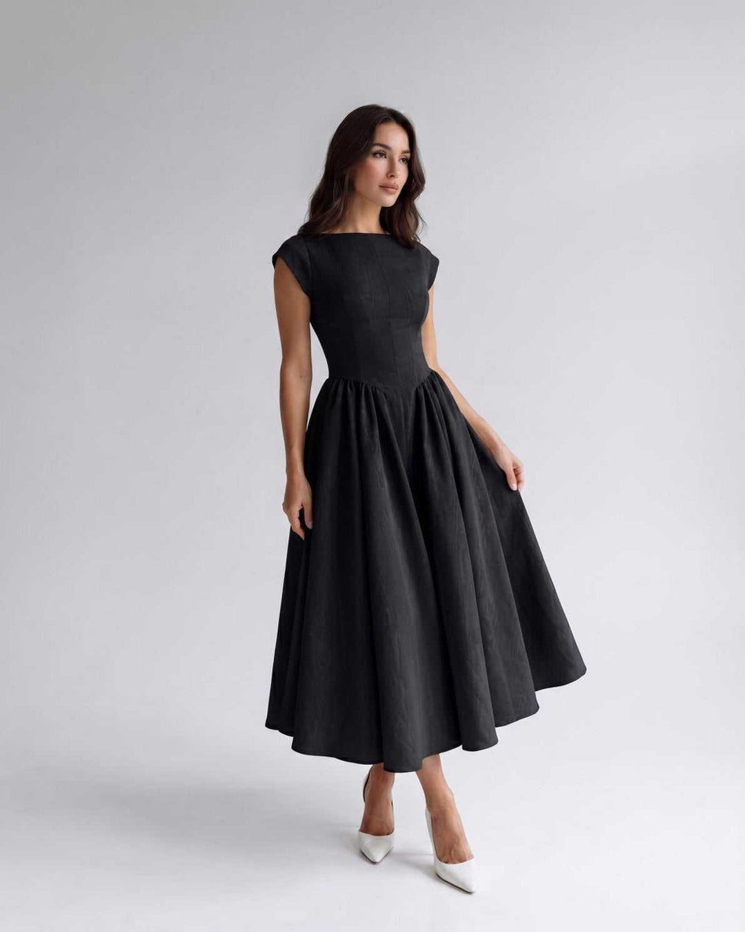 Women's occasion wear midi dress, A-line, sleeveless, flared, with a beautiful gathered waist.