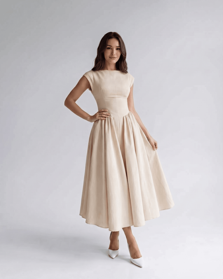 Versatile women's midi dress, A-line, sleeveless design, perfect for summer & autumn style.