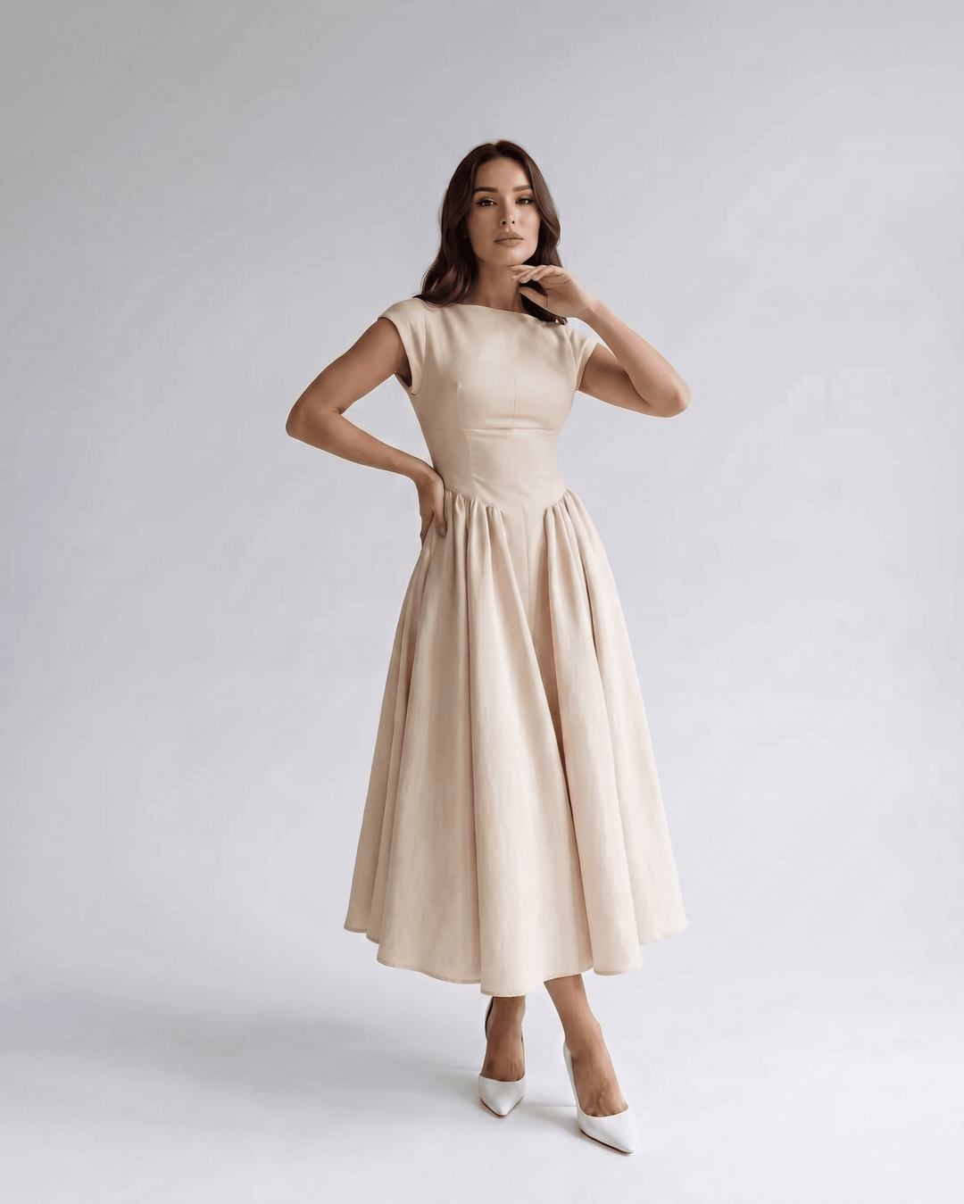 Chic women's sleeveless A-line midi dress, elegant occasion wear, round neck, midi length.