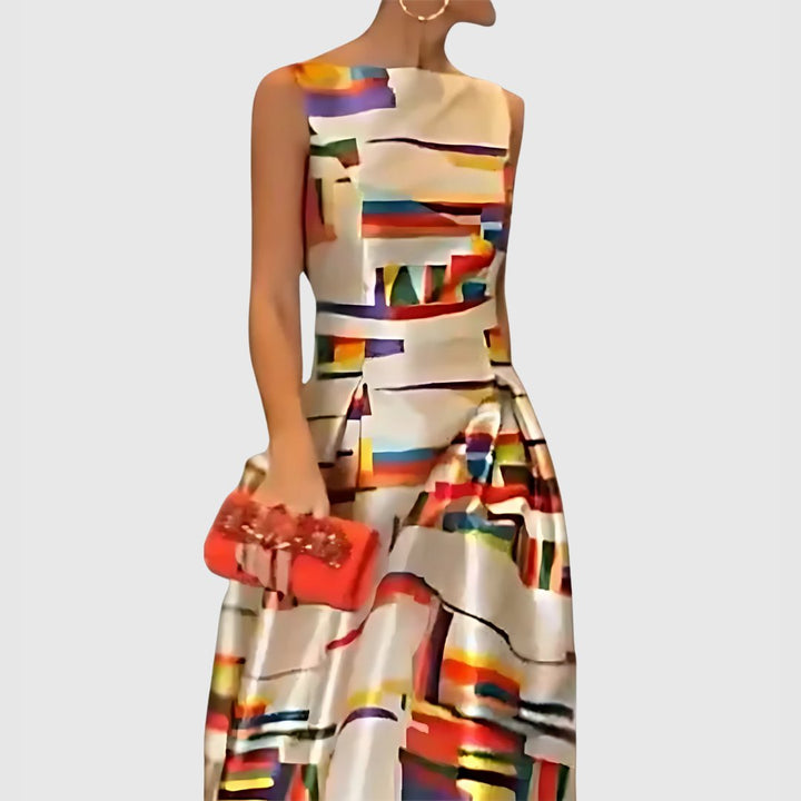Statement A-line maxi dress for women, featuring a vibrant abstract print and sleeveless design, perfect for parties.