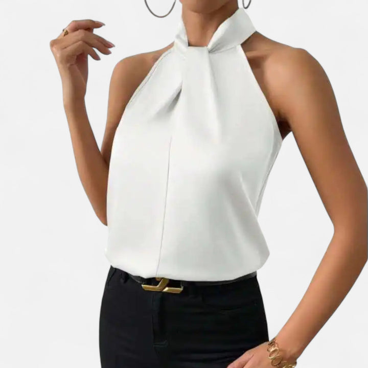 Flowy women's sleeveless top featuring an elegant twisted neck design, a versatile piece for sophisticated looks.