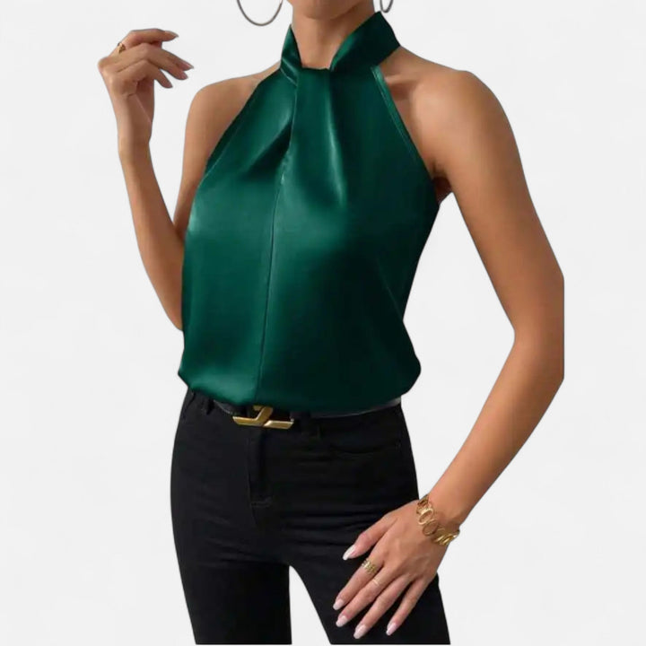 Stylish women's sleeveless top showcasing a twisted neck, a must-have for elegant spring and summer wardrobes.