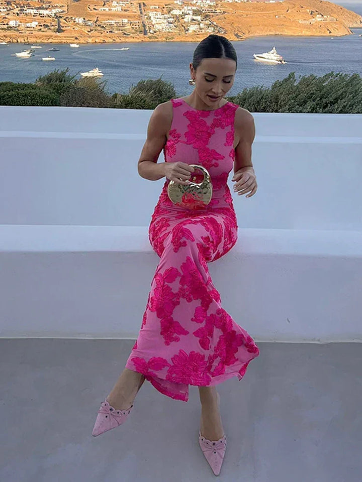 Beautiful women's floral sleeveless maxi dress, offering an elegant fitted silhouette for special occasions.