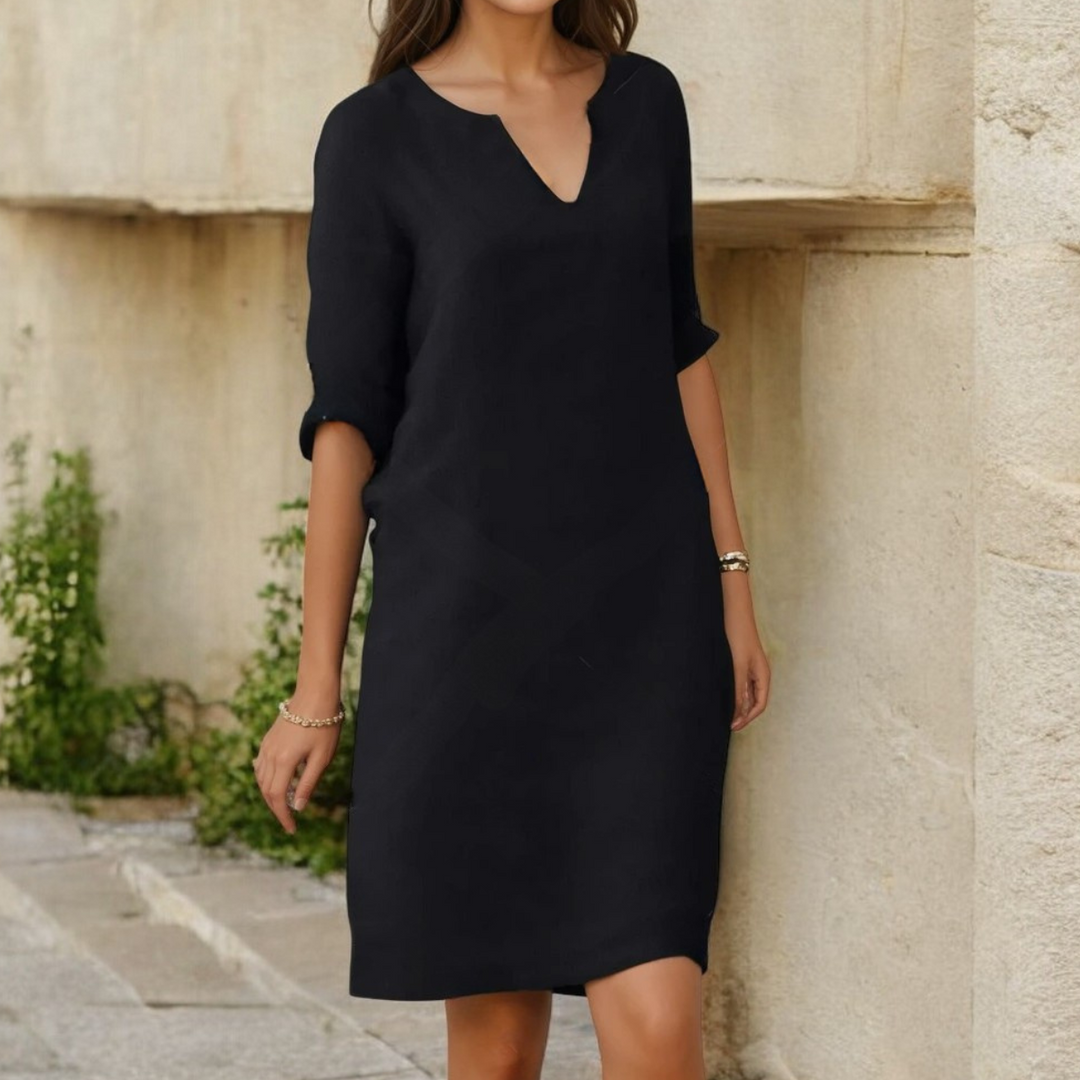 Elegant women's sleeveless midi dress for summer. Comfortable, flattering fit, perfect for casual or party wear.
