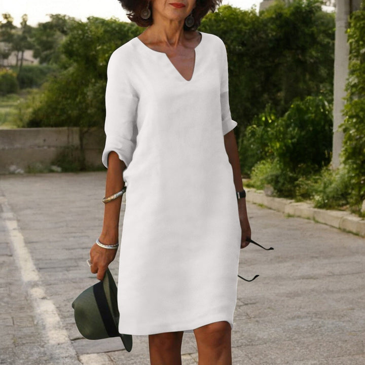 Women's elegant summer dress offers ultimate comfort & chic style. Sleeveless midi length, perfect for any day.