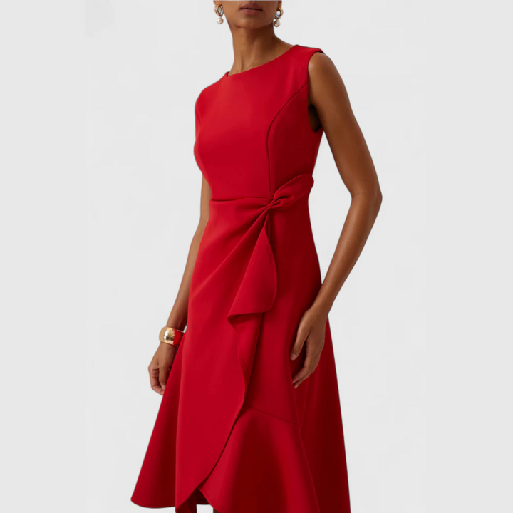 Fashion-forward women's sleeveless midi dress with an elegant draped asymmetrical hem for evenings.