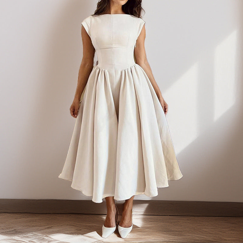 Stylish women's sleeveless midi dress with elegant pleats, a perfect choice for spring and summer formal wear.
