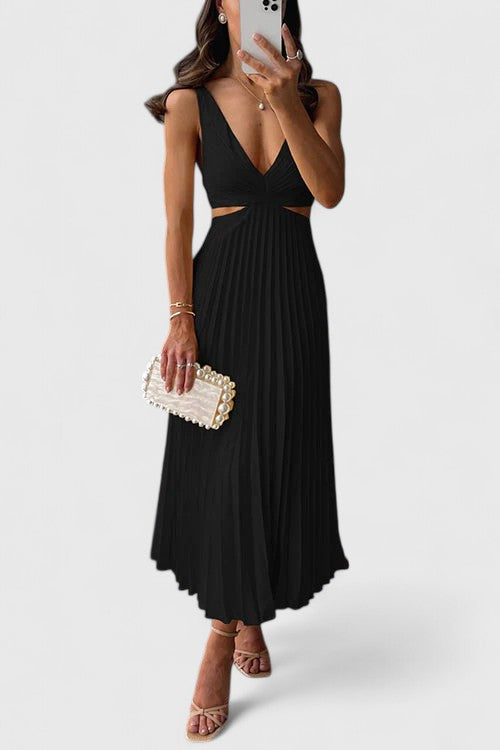 Chic women's pleated cocktail dress, perfect as a wedding guest outfit.