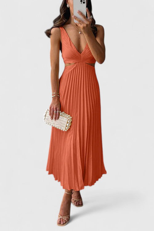 Stylish women's elegant wedding guest dress with sleeveless pleated design.